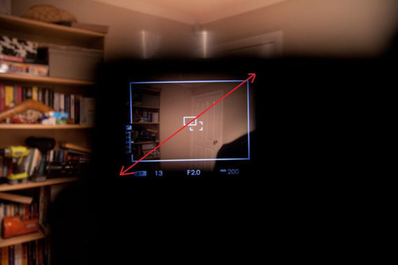 Fuji X-Pro 1 viewfinder physical size features an image taken trough the viewfinder of the camera taken inside of a room for the purpose of showing how large is the viewing angle.